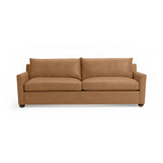 Classic Home Olivia stationary sofa with plush cushions and elegant fabric, showcasing a stylish, comfortable living room piece.