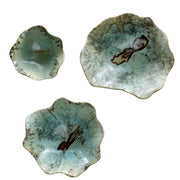 Set of three Uttermost Teo wall decor pieces featuring modern, abstract designs for stylish home interior accents.