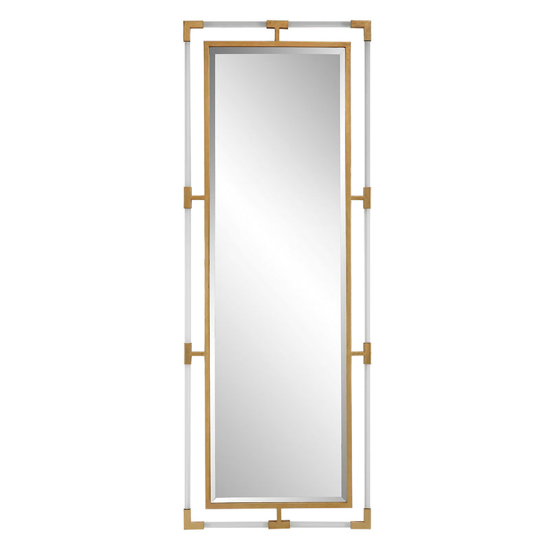 Uttermost Balkan Iron Wall Mirror with a decorative iron frame, hanging on a wall in a stylish interior setting.