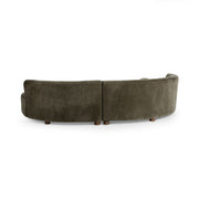 Classic Home Octavia stationary sectional sofa with plush cushions and modern design, shown in a spacious living room setting.