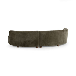 Classic Home Octavia stationary sectional sofa with plush cushions and modern design, shown in a spacious living room setting.
