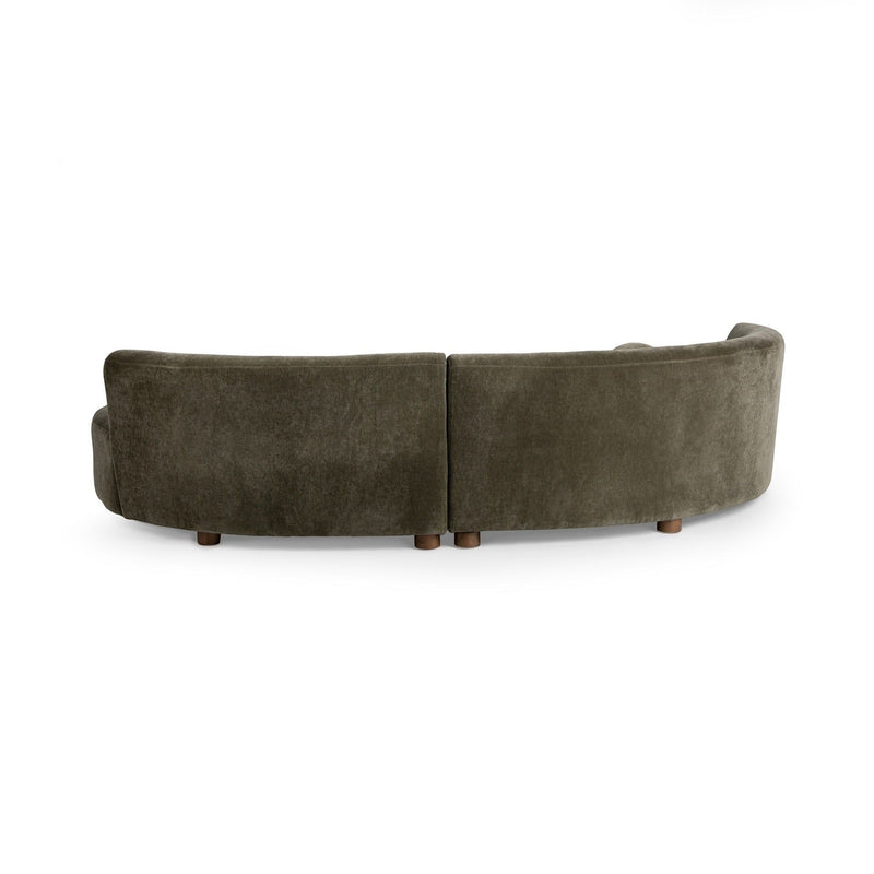 Classic Home Octavia stationary sectional sofa with plush cushions and modern design, shown in a spacious living room setting.