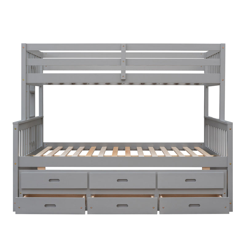 DreamHaus bunk bed with twin-size trundle and built-in drawers, featuring sturdy wood construction and space-saving design.