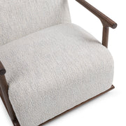 Classic Home Lucia swivel chair with plush upholstery and modern design, shown in a cozy living room setting.