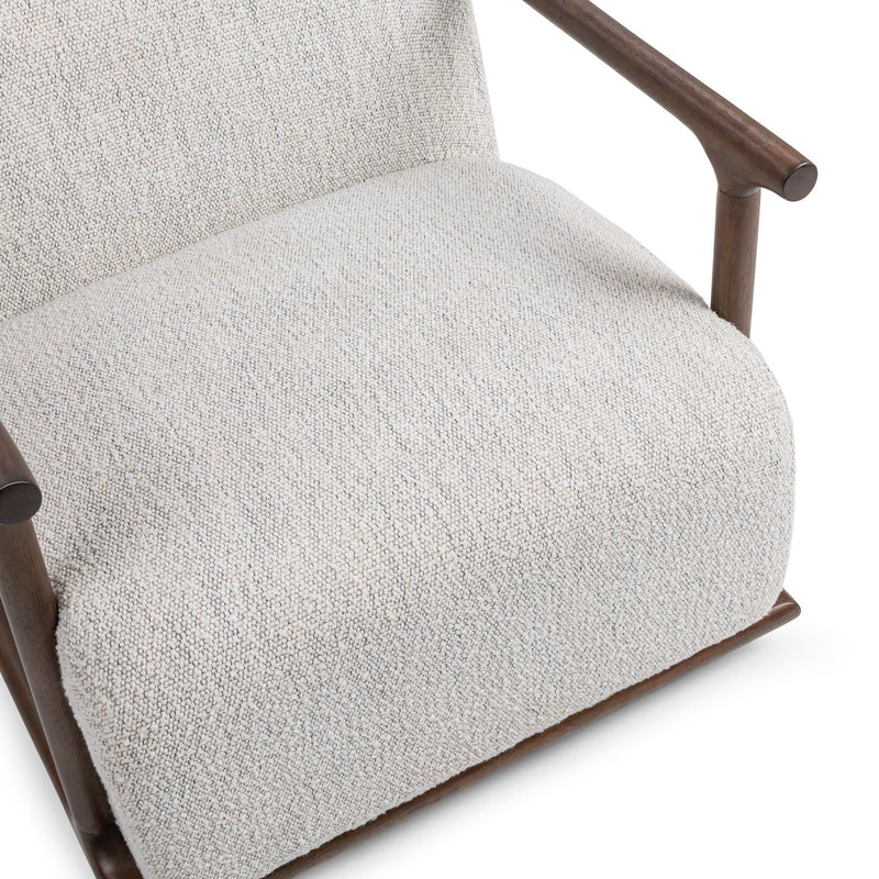 Classic Home Lucia swivel chair with plush upholstery and modern design, shown in a cozy living room setting.