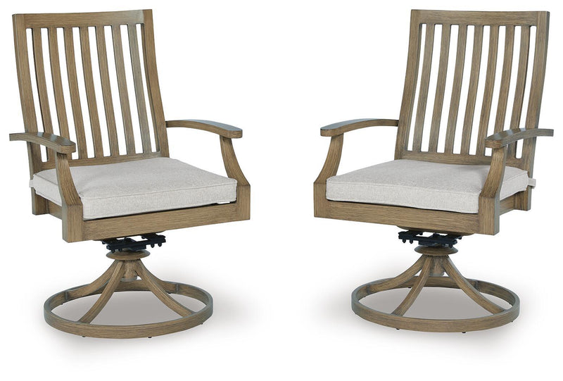Set of two brown and beige swivel chairs with cushions from Signature Design by Ashley Rainier Ranch collection.
