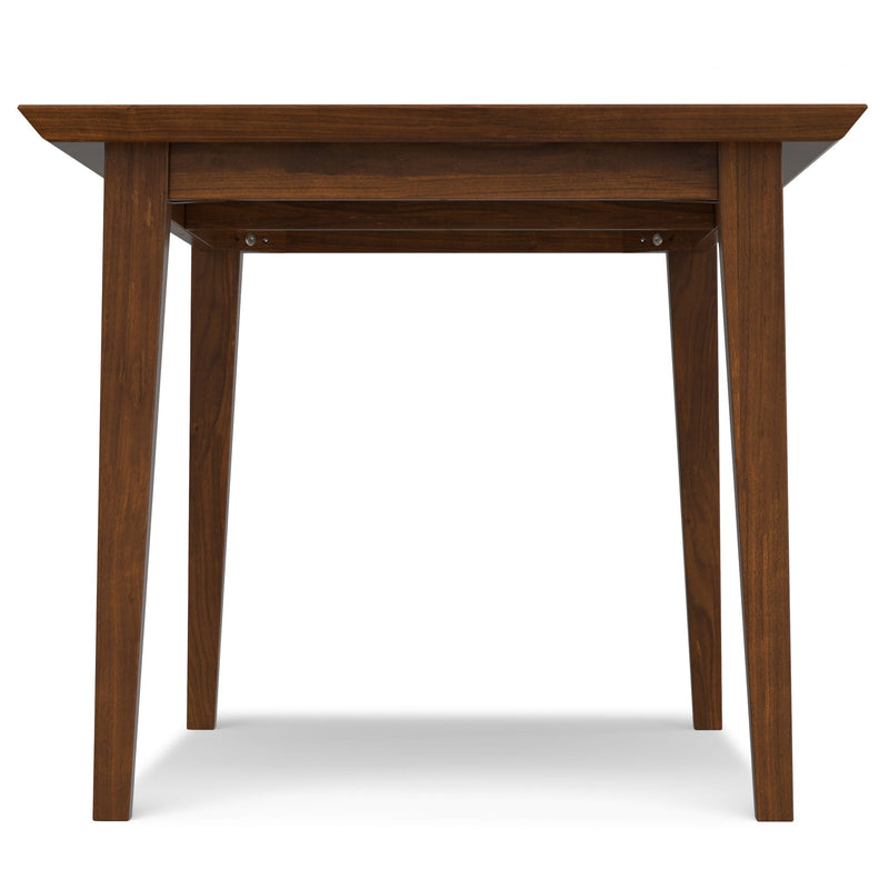 Contemporary Colby dining table by Simpli-Home with a sleek wooden surface and sturdy legs, ideal for modern dining rooms.
