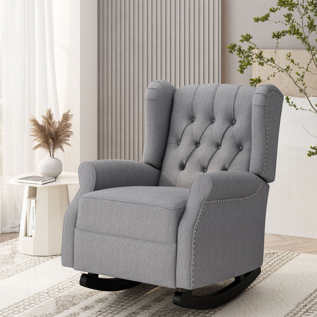 Noble House Sheila gray fabric tufted wingback rocking chair with curved armrests and wooden base, stylish and comfortable.