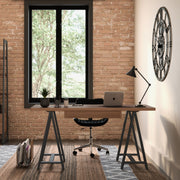 Handcrafted solid wood sawhorse used as a writing desk by Simpli-Home, showcasing a sturdy, natural wood finish and functional design.