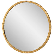 Round industrial wall mirror by Uttermost with a metal frame, perfect for modern or rustic interior decor.