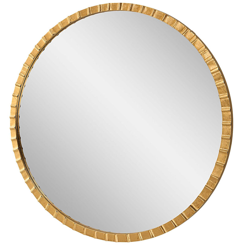 Round industrial wall mirror by Uttermost with a metal frame, perfect for modern or rustic interior decor.