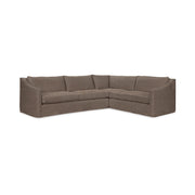 Comfortable Kipton upholstered corner sectional by Classic Home, showcasing plush cushions and modern design in a cozy living room setting.
