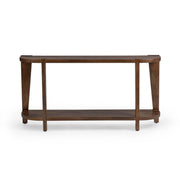 Round coffee table from the Alenna collection by Classic Home featuring a sleek design and smooth wooden surface.