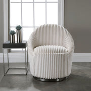 Uttermost Crue Fabric Swivel Chair with cushioned seat and modern design, shown in a stylish living room setting.