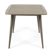 Modern indoor square acacia wood dining table with toothpick leg design, by Noble House, showcasing sleek and stylish craftsmanship.