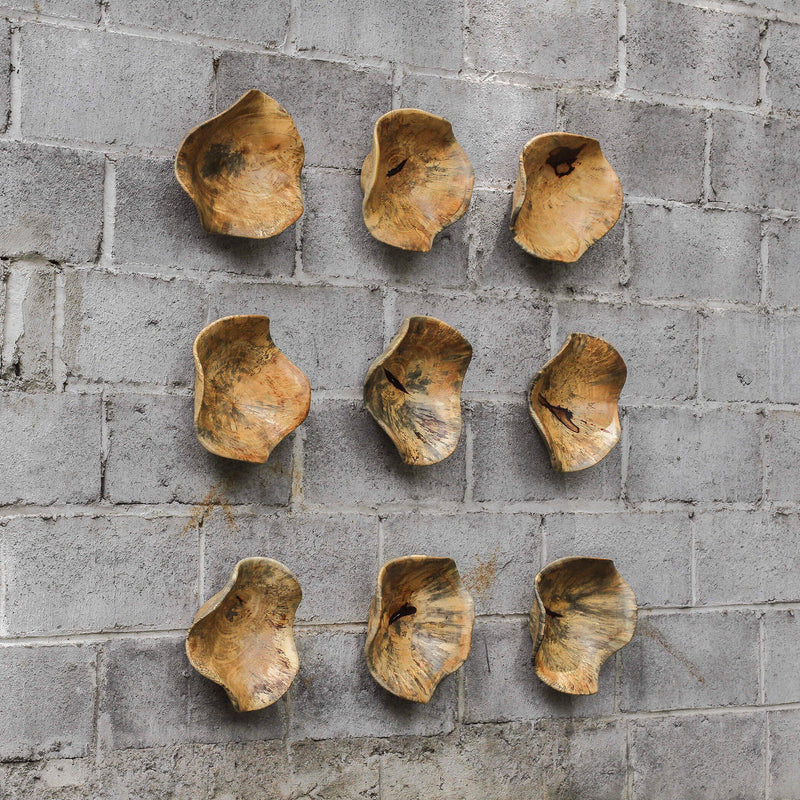 Set of three Tamarine wood wall art pieces in light brown, decorative wall decor by Uttermost featuring textured, natural wood finish.