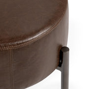 Classic Home Aimie accent stool with wooden legs and cushioned fabric seat, ideal for living rooms or bedrooms.