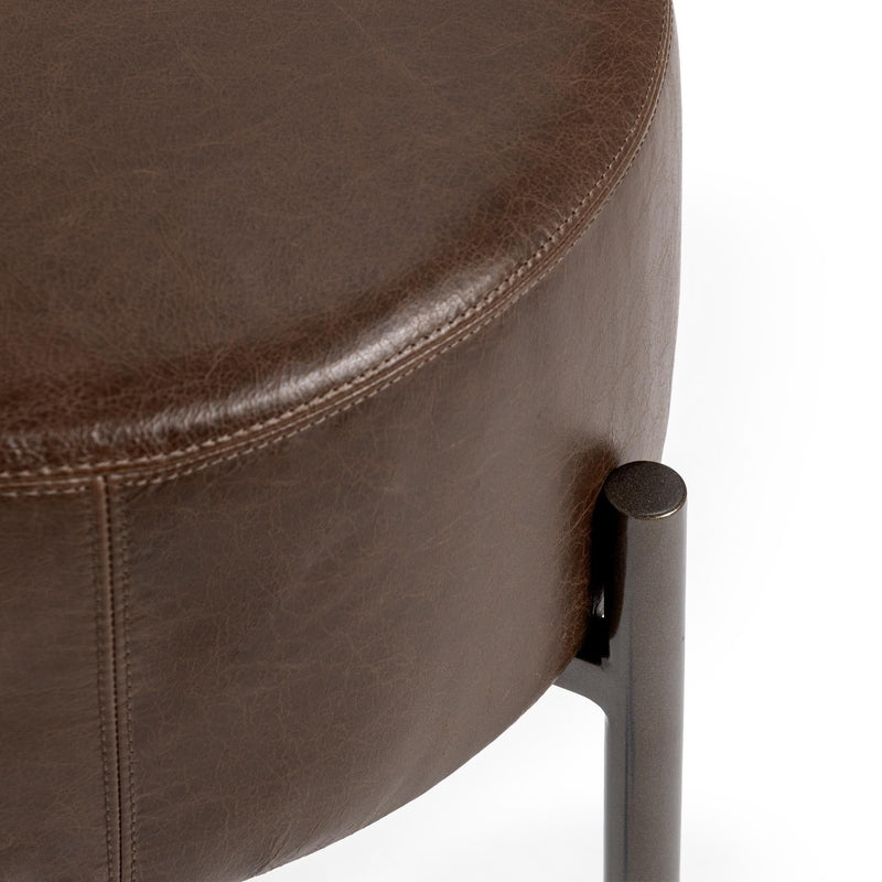 Classic Home Aimie accent stool with wooden legs and cushioned fabric seat, ideal for living rooms or bedrooms.