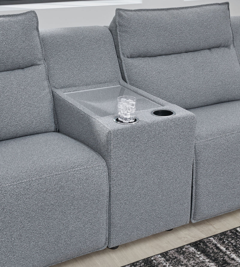 Signature Design by Ashley Modmax II reclining sectional in salt and pepper fabric, showing its plush cushions and reclining features.