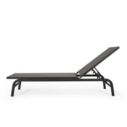 Noble House Finn outdoor chaise lounge with cushioned seat and modern design for outdoor relaxation.