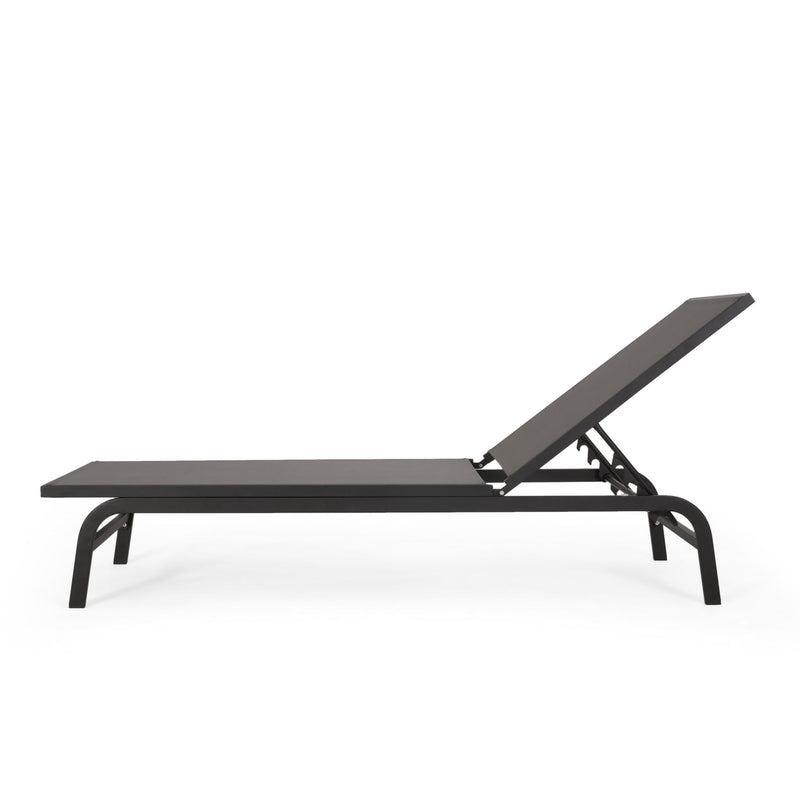 Noble House Finn outdoor chaise lounge with cushioned seat and modern design for outdoor relaxation.