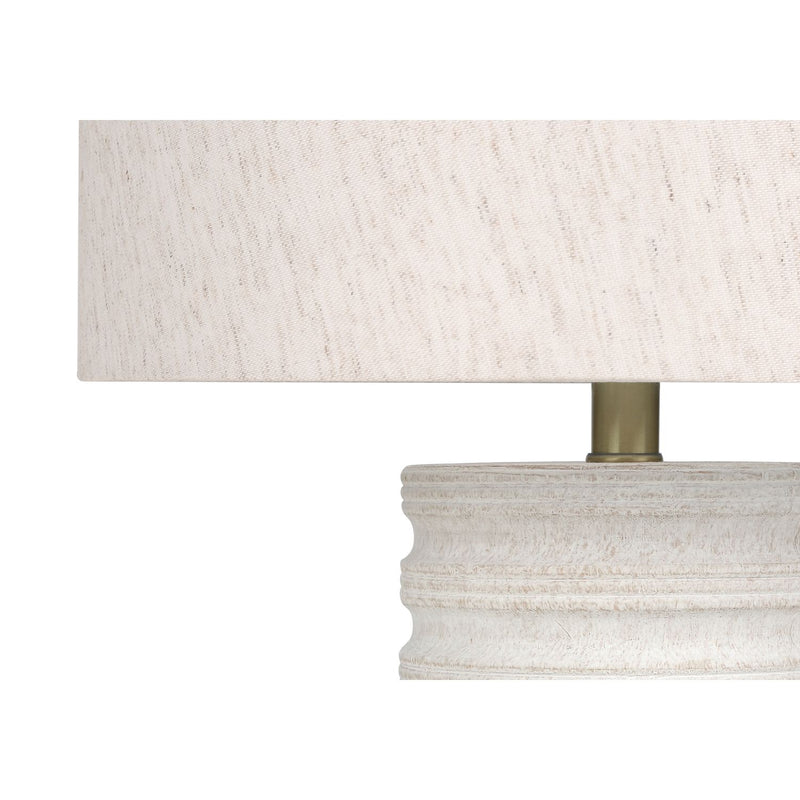 Cream resin transitional table lamp by 8th Street, featuring a sleek modern design with a rounded base and matching shade.