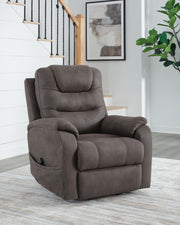 Signature Design by Ashley Snowfield Power Lift Recliner in gunmetal, featuring plush cushioning and a sturdy lift mechanism.
