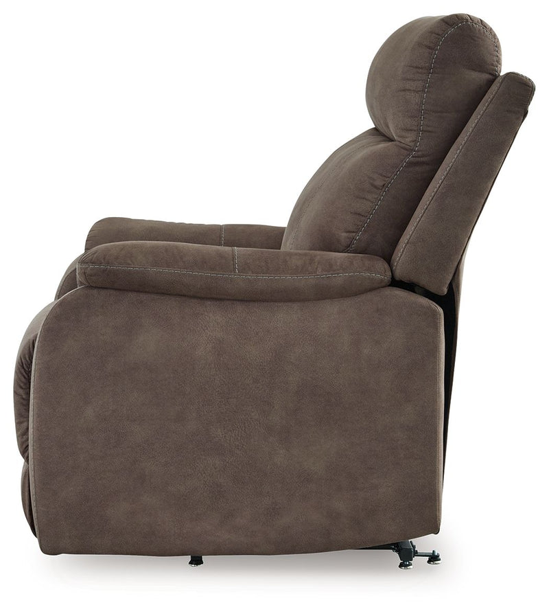 Signature Design by Ashley Crestmeade Power Lift Recliner in tan fabric with plush cushioning and ergonomic design.