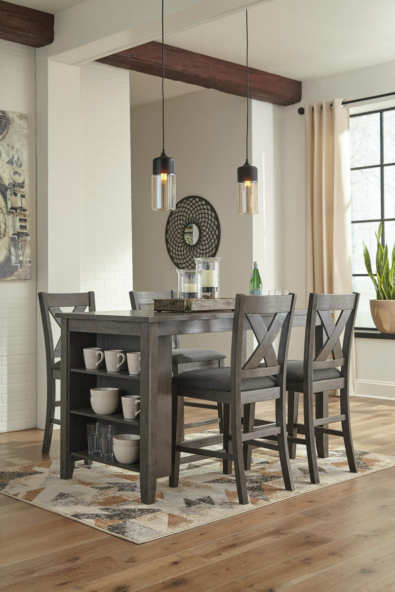 Set of two Signature Design by Ashley Caitbrook gray upholstered barstools with cushioned seats and wooden legs.