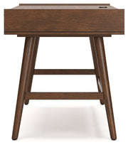 Signature Design by Ashley Lyncott home office desk with a sleek wooden surface and sturdy metal legs for writing and workspace.