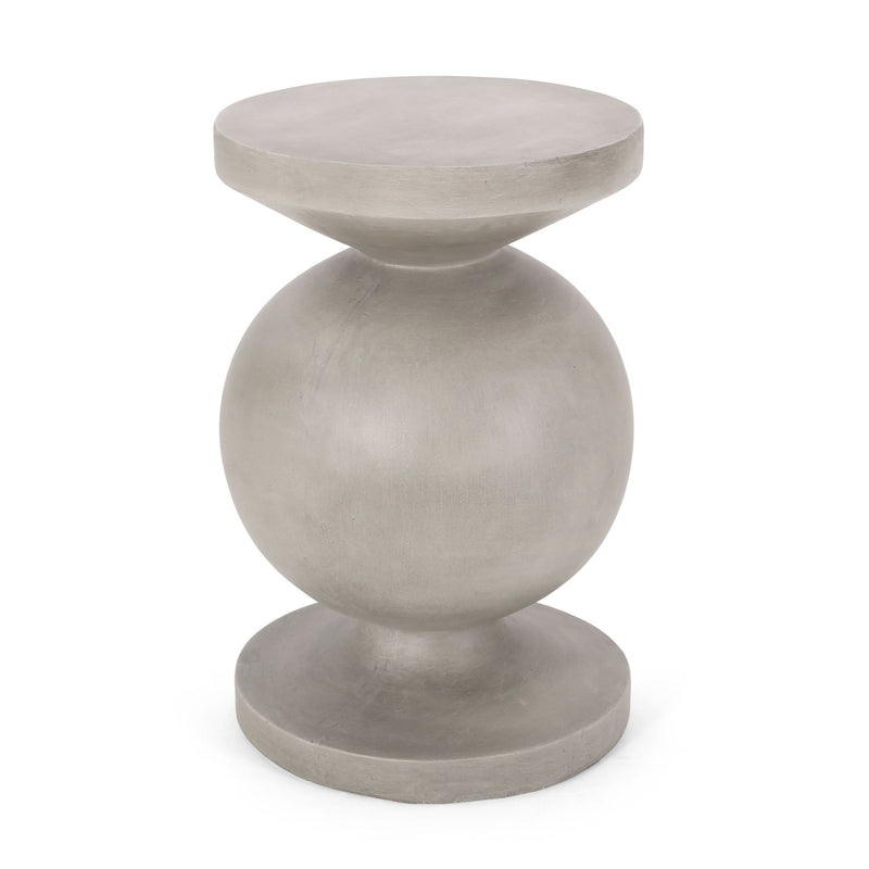 Noble House outdoor end table in natural finish, featuring a round wooden surface and sturdy legs for patio or garden use.