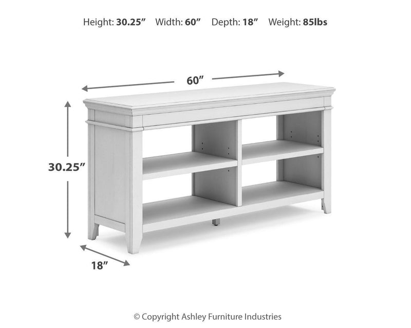 Signature Design by Ashley Kanwyn credenza in whitewash finish with sleek storage and modern design.