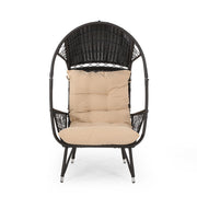 Noble House outdoor wicker standing basket chair with cushion, accent chair for patio or garden seating.