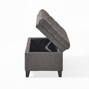 Juliana storage ottoman by Noble House with birch wood legs, featuring a cushioned top and interior storage space.