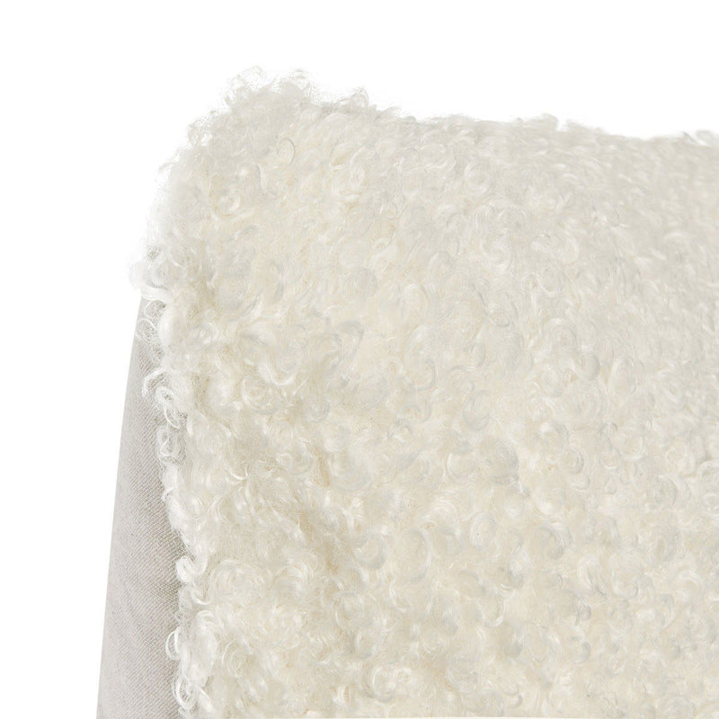Ivory Carters 22x22 inch accent pillow with a soft fabric cover, designed for decorative use on sofas or beds.