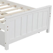 DreamHaus trundle platform bed with open frame and slatted headboard, showcasing a modern bedroom furniture design.