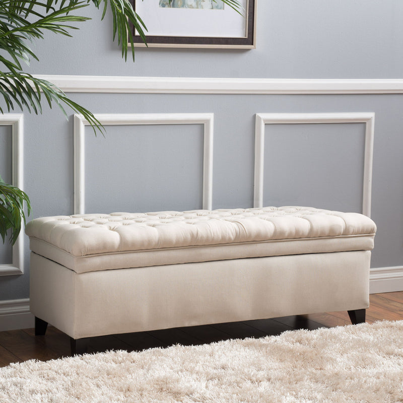 Juliana storage ottoman with birch wood legs by Noble House, featuring a cushioned top and spacious interior for storage.