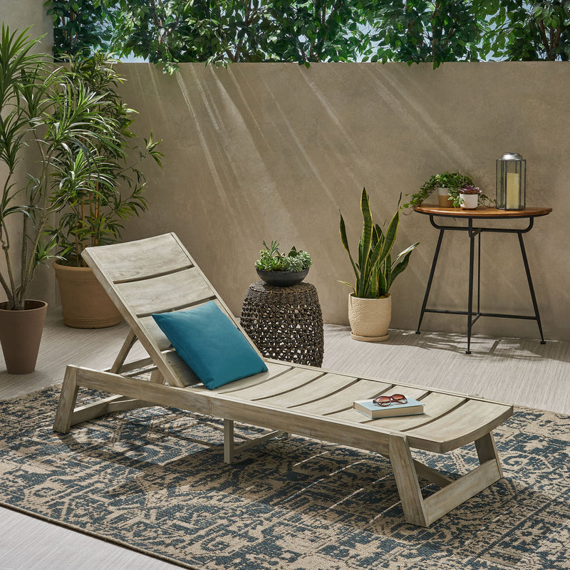 Noble House Maki chaise lounge with modern design, featuring a sleek frame and cushioned seating for stylish relaxation.