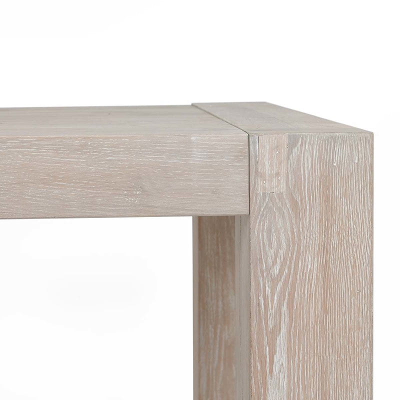 Classic Home Bristol dining table with wooden surface and sturdy legs, ideal for modern or traditional dining rooms.