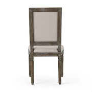 Noble House traditional style dining chair set with fabric upholstery, featuring elegant wooden frames and cushioned seats.