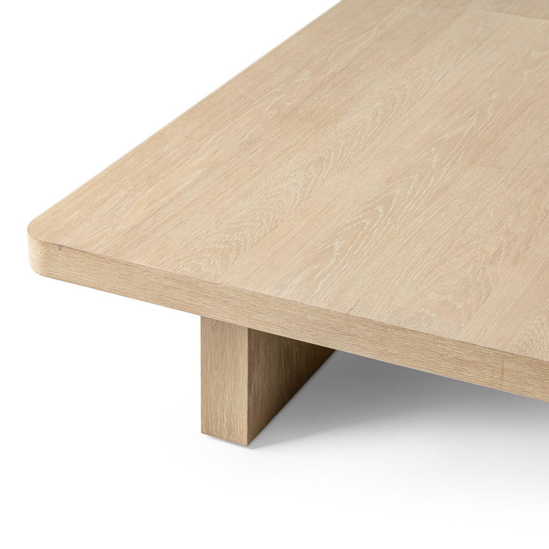 Classic Home Melina coffee table with a sleek wooden top and modern design, perfect for living room decor.