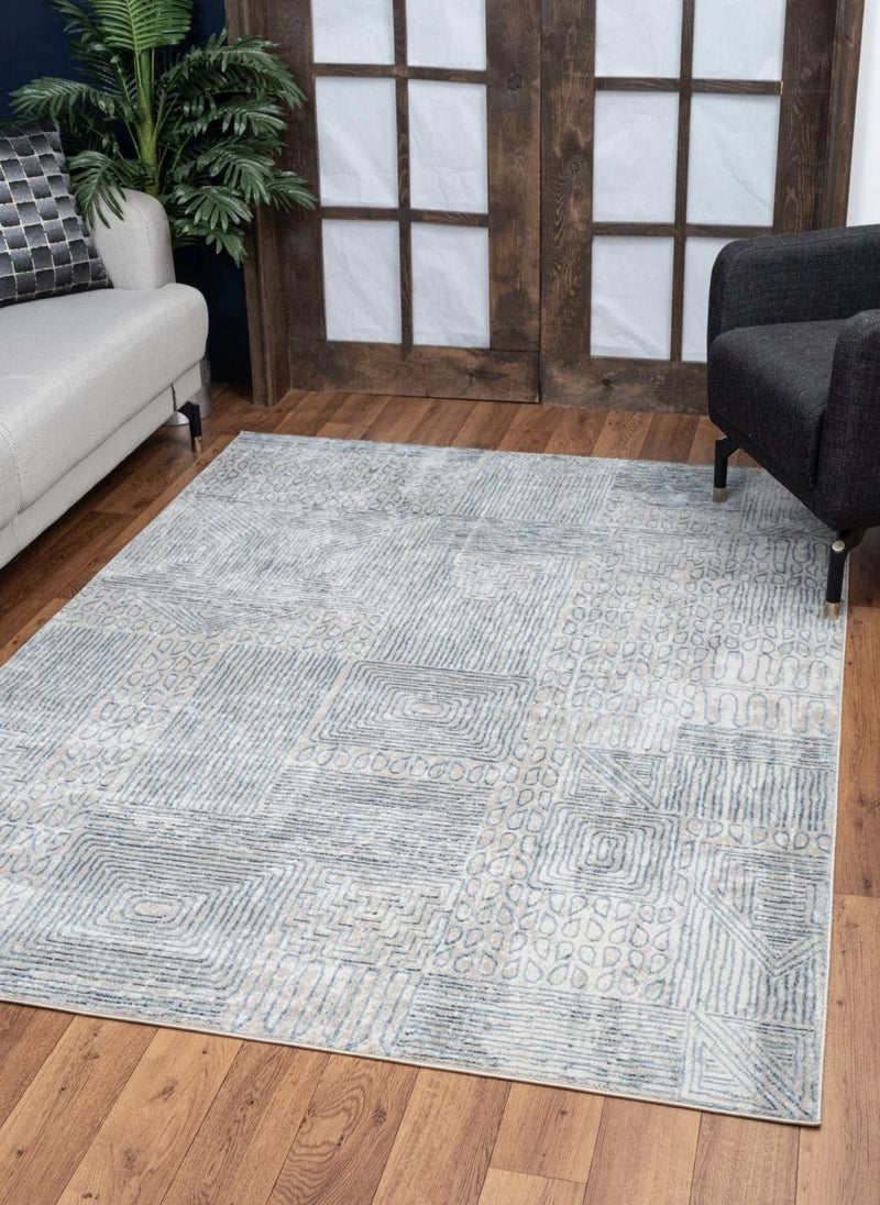 Elegance - 5'3" X 7'3" Area Rug - Blue - R&R Furniture Gallery (Fountain Valley, CA)
