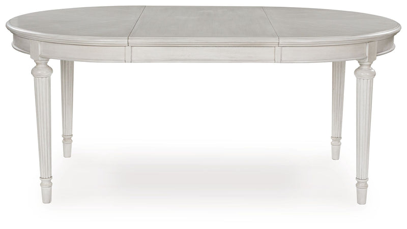 Montelaine - Oval Dining Room Extension Table - Antique White - R&R Furniture Gallery (Fountain Valley, CA)