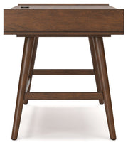 Signature Design by Ashley Lyncott home office desk with spacious surface and modern style, ideal for writing and workspace organization.