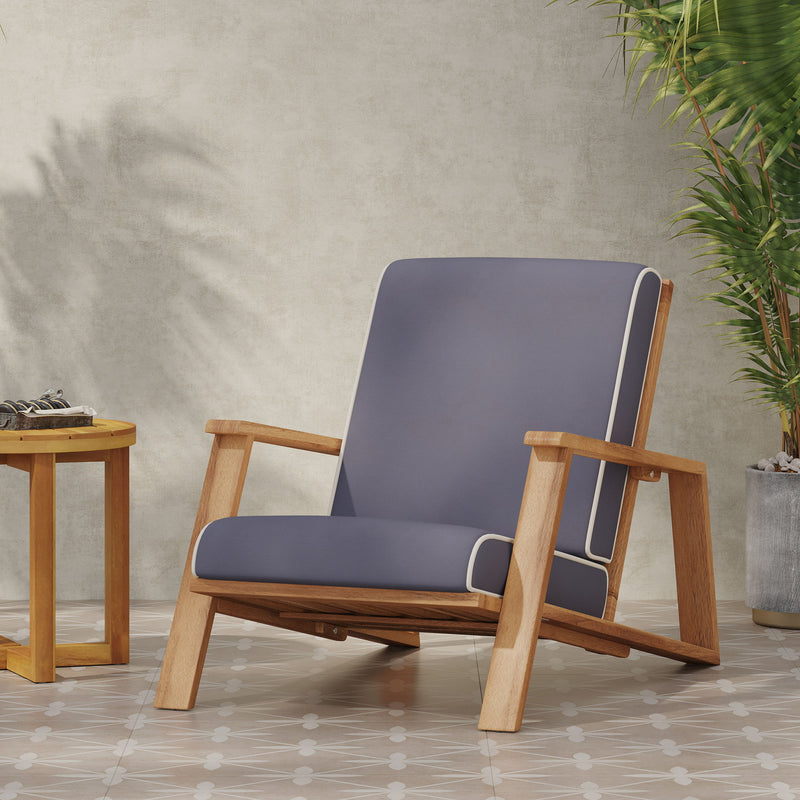 Noble House outdoor patio lounge arm chair with cushioned seat and backrest, stylish outdoor club chair for garden or patio seating.