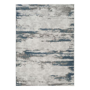 Geometrix - 5'3" X 7'3" Area Rug With Geometric 3D Effect - Gray / Ivory - R&R Furniture Gallery (Fountain Valley, CA)