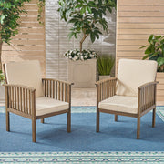 Pair of Noble House Casa Acacia wood club chairs with water-resistant gray and cream cushions, stylish outdoor seating set.