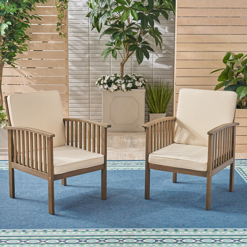 Pair of Noble House Casa Acacia wood club chairs with water-resistant gray and cream cushions, stylish outdoor seating set.