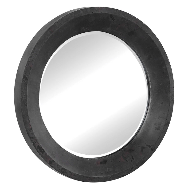 Round black industrial wall mirror by Uttermost, featuring a sleek metal frame and modern design for stylish home decor.