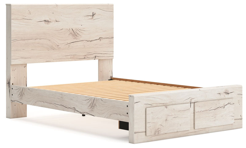 Signature Design by Ashley Lawroy panel bed with storage, showcasing the bed frame and built-in storage drawers in a modern bedroom setting.